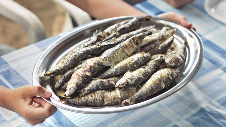 cooked sardines on a platter