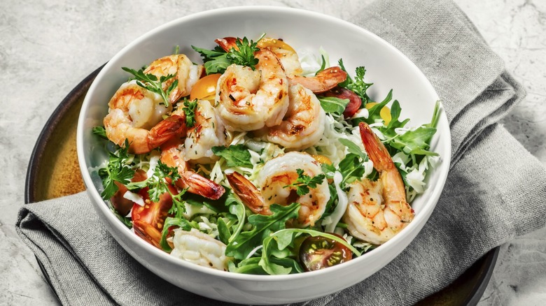 shrimp salad in a white bowl