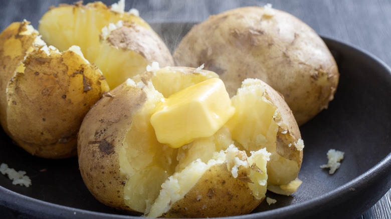 baked potatoes with butter