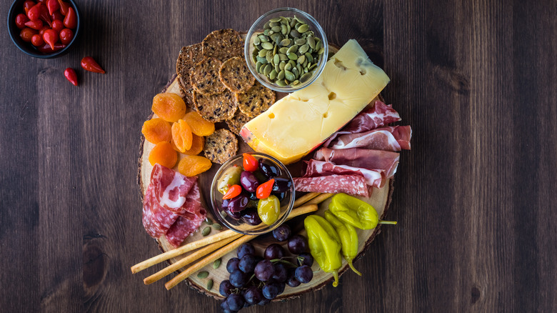 Cheese board with pumpkin seeds