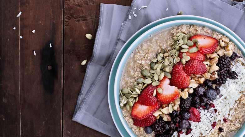 Oatmeal bowl with berries and pepitas