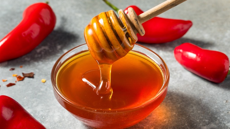 Bowl of honey with chilis