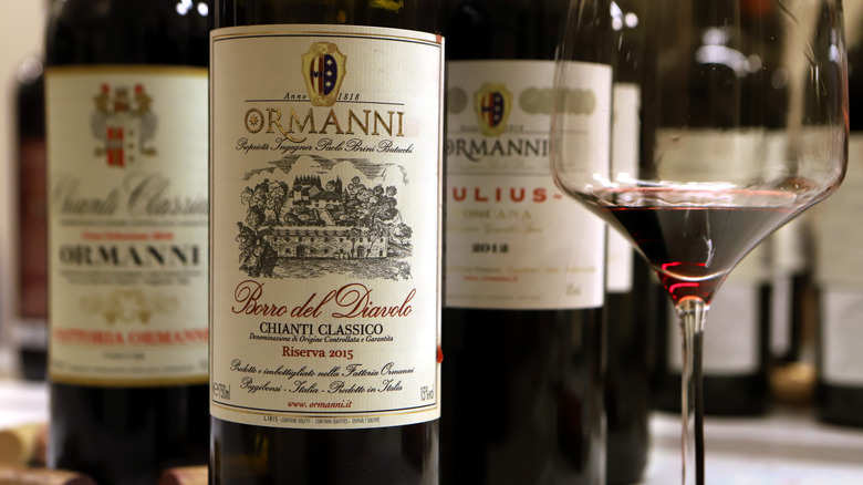 Chianti classico wine bottle and a tasting pour in a glass