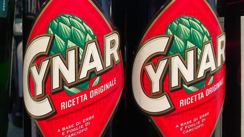 Close-up of two bottles of Cynar liqueur