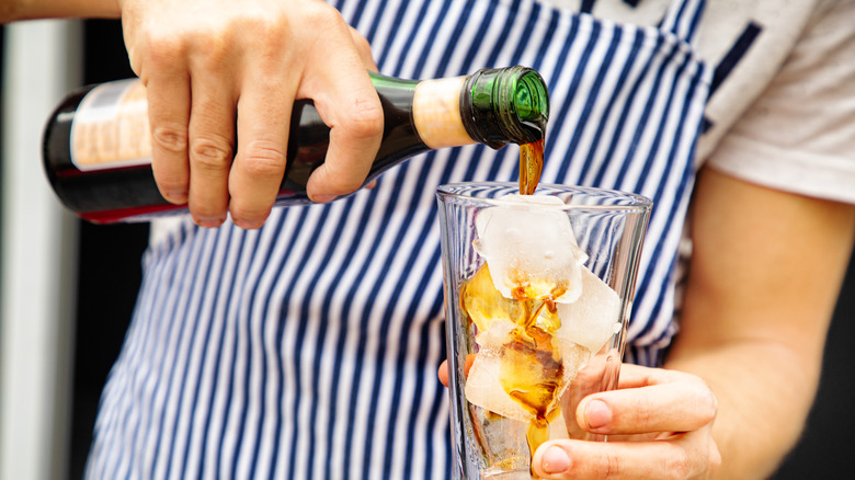 bartender pouring fernet