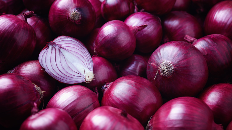 group of raw red onions