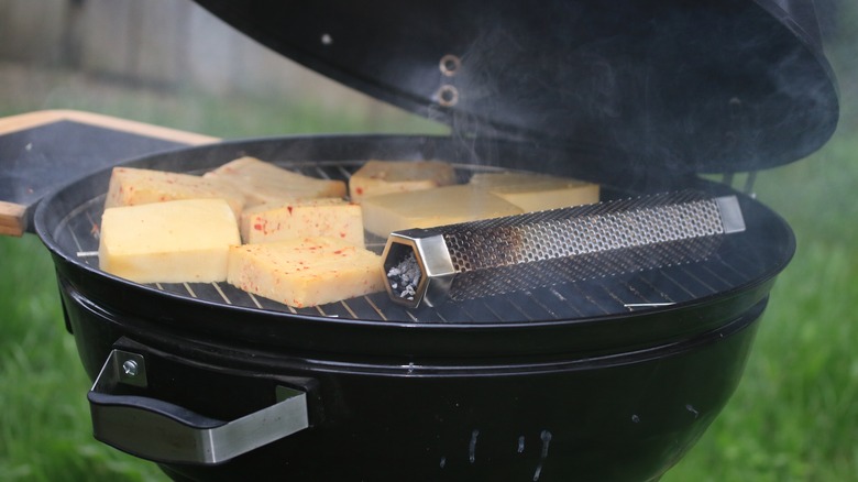 cheese and smoker tube on grill