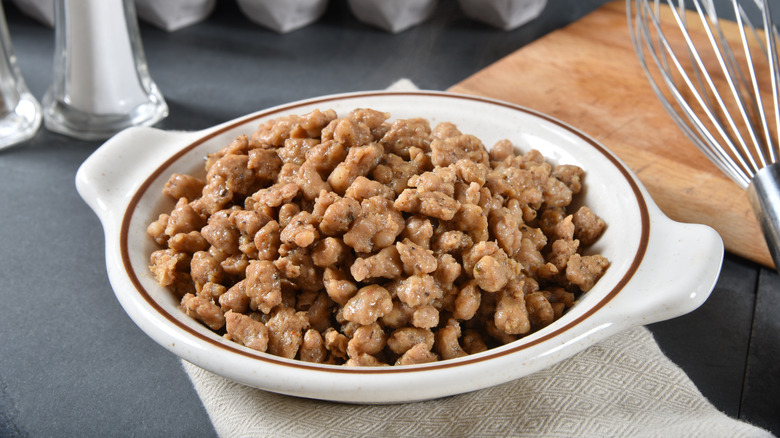 A bowl of crumbled sausage 