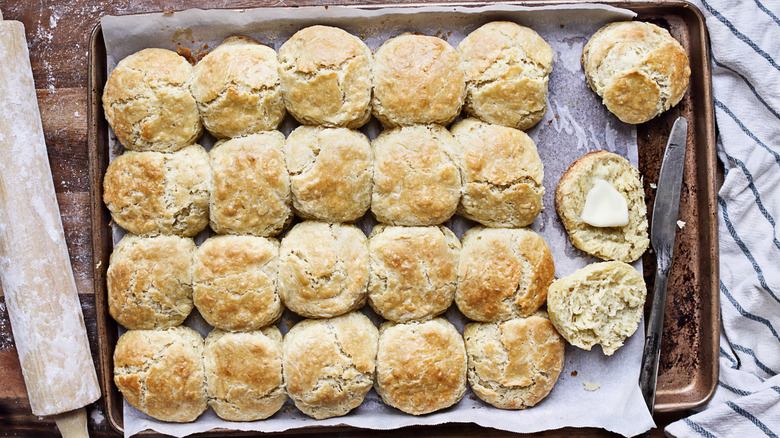 Baked biscuits on baking sheet 