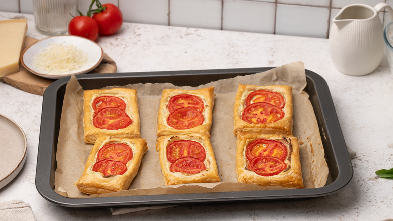 Tomato tarts on pan