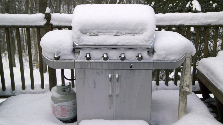 Grill covered in snow