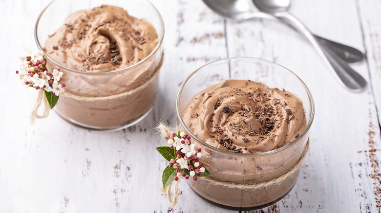 glasses of chocolate mousse with decorative string