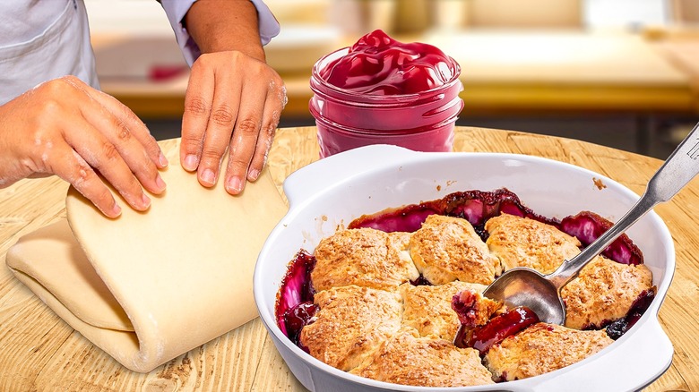 Baker folding dough beside cobbler