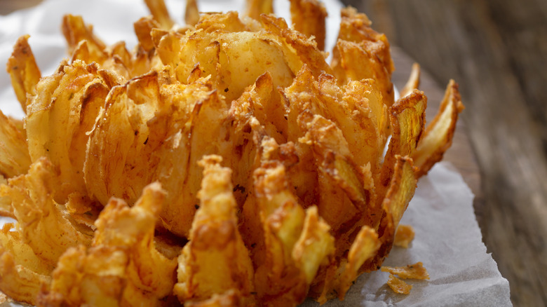 blooming onion on wax paper