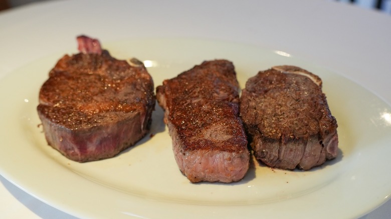 Seared steaks on plate 