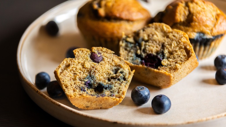 whole and split blueberry muffins