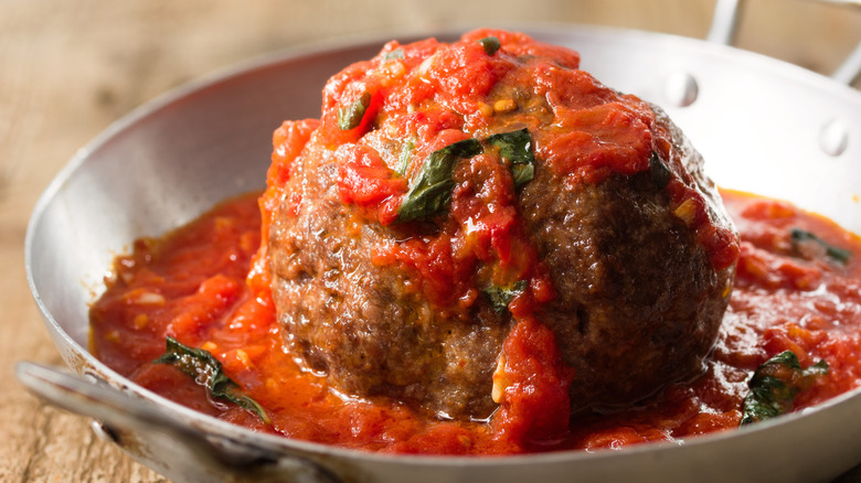 big Italian meatball in sauce