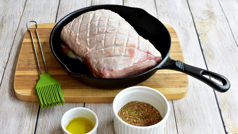 scored pork tenderloin before cooking