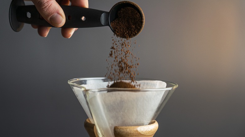 ground coffee into chemex