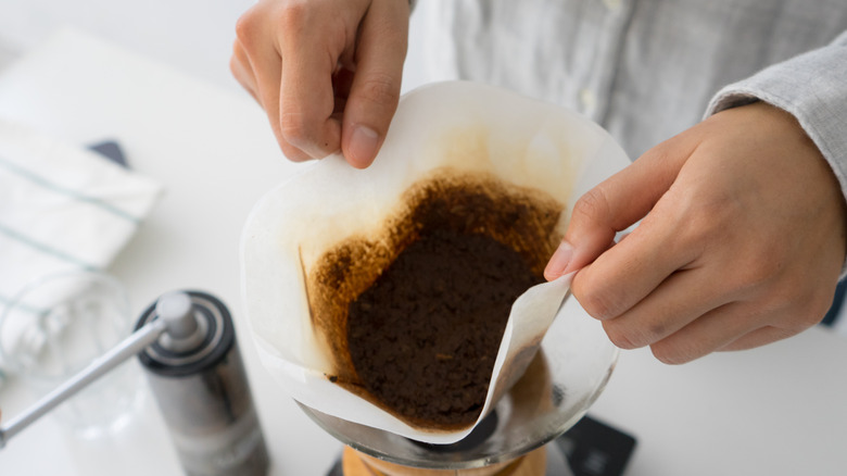 removing used coffee filter