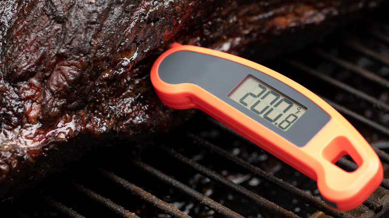 Meat thermometer in a side of beef 