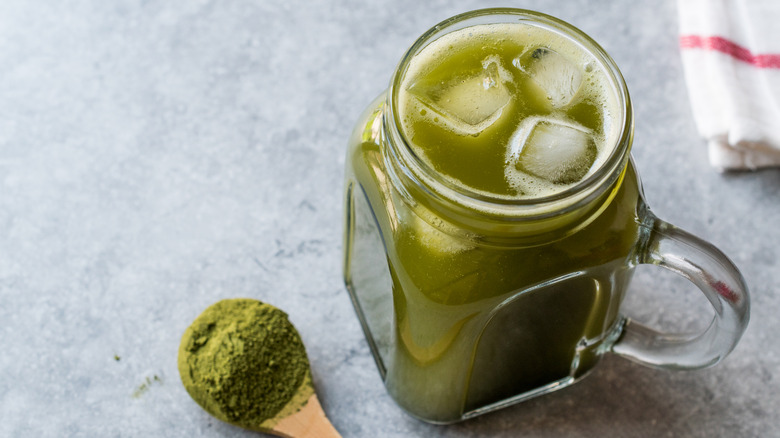 matcha tea in a mason jar with ice