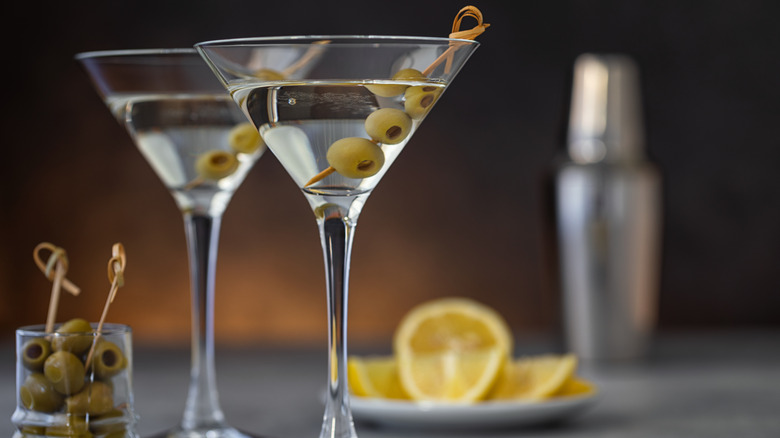 two classic martinis with olives