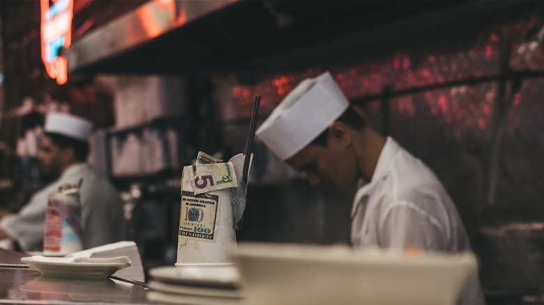 tip cup on deli counter