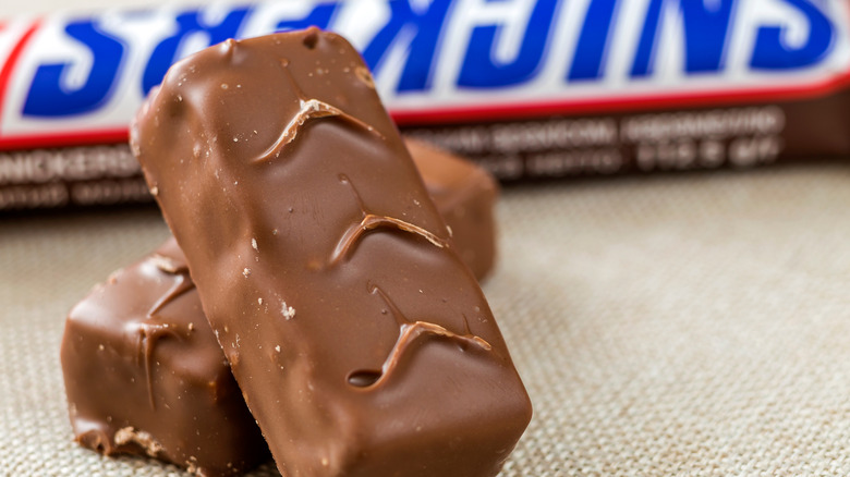 unwrapped Snickers bar