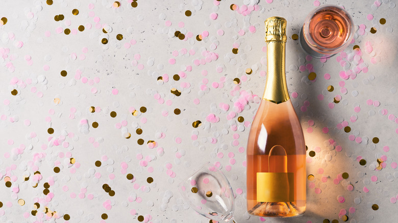 rose champagne bottle and glass