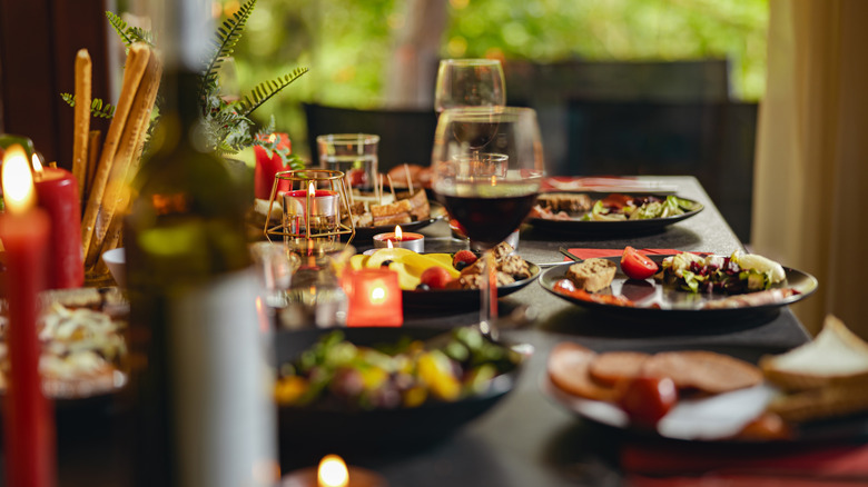 View of dining table with food and drinks