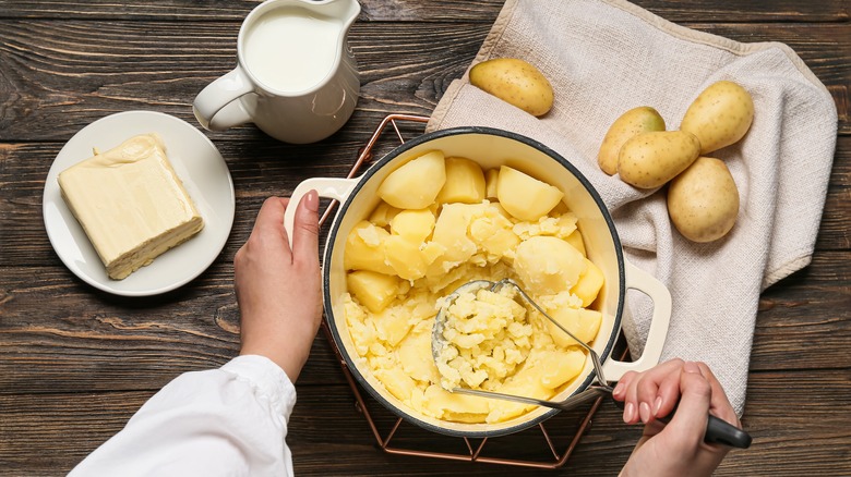 chef preparing mashed potatoes 