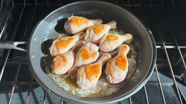 Browned honey-glazed chicken in pan