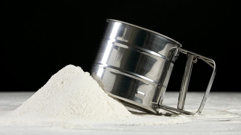 Sifter and pile of flour