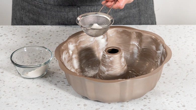 Greasing a bundt cake pan 