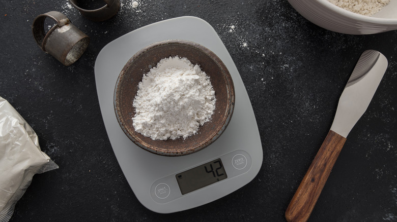 Measuring flour on digital scale