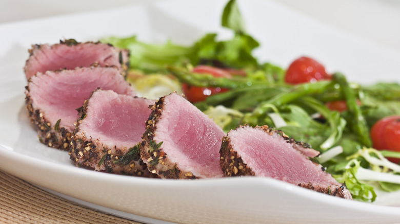 tuna steak sliced on plate