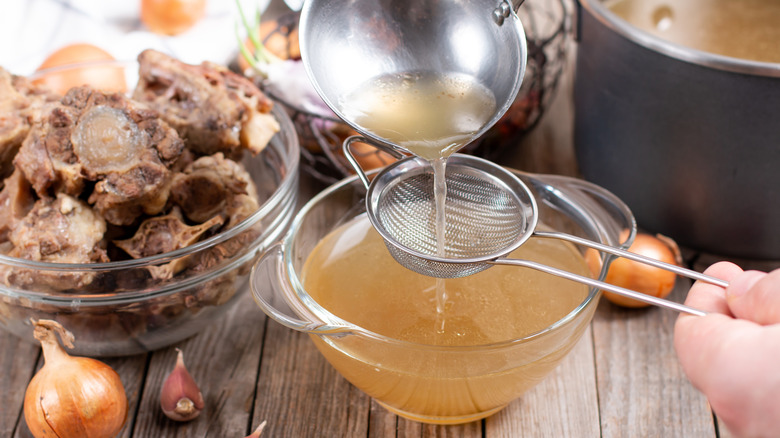 Straining bone broth 