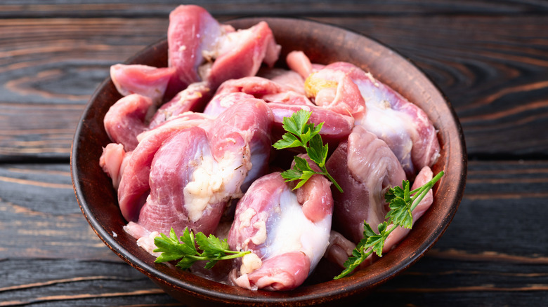 Raw turkey giblets in a bowl