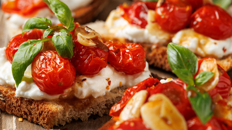 roasted cherry tomatoes on cheese toast