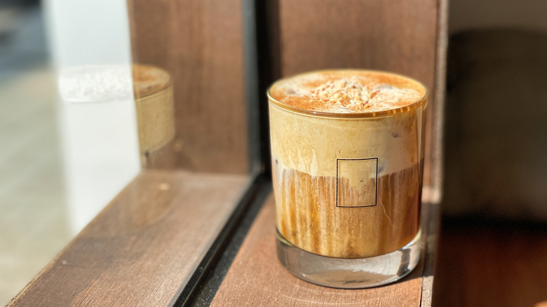 iced coffee on a window sill