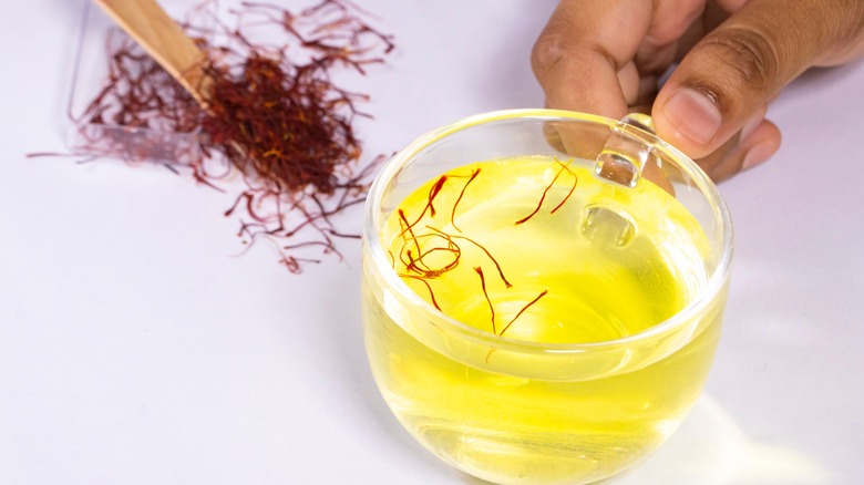 saffron threads in hot water