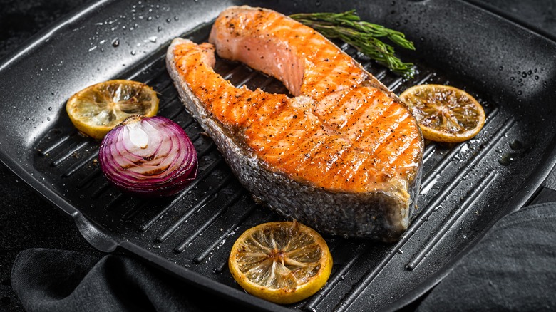 Grilled salmon steak in pan