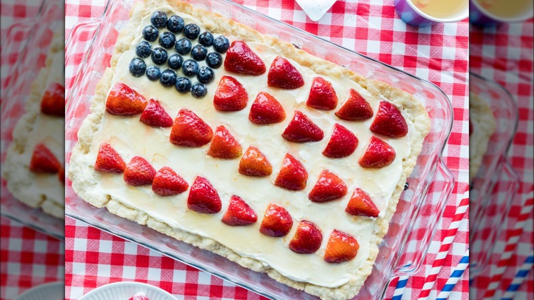 no bake cheesecake decorated with strawberries and blueberries