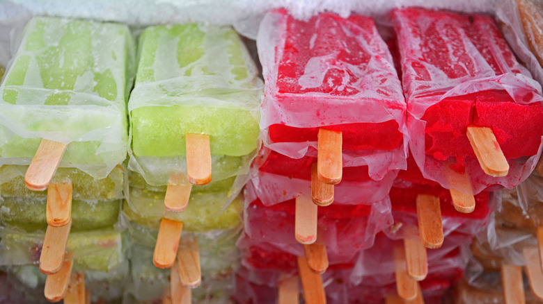 Popsicles stacked in freezer