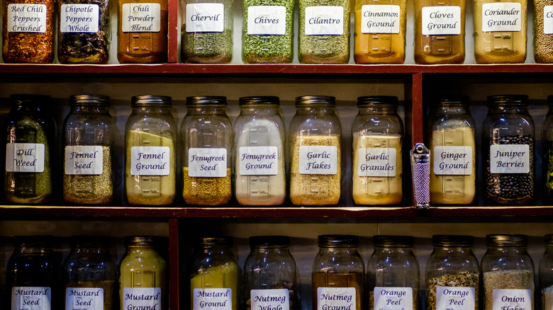 Labeled spices on shelves