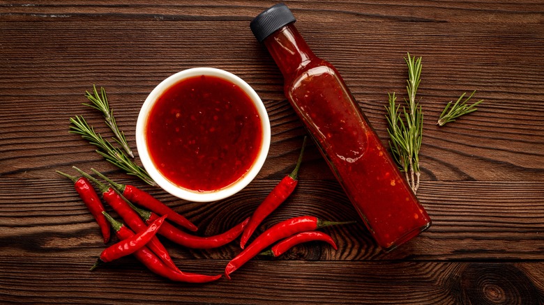 Hot sauce, chili peppers, and thyme