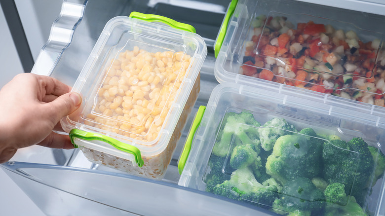 Vegetables in containers in fridge