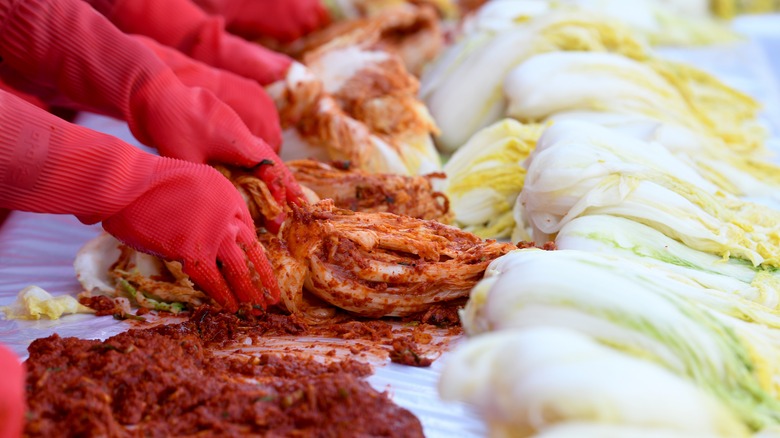 workers preparing kimchi