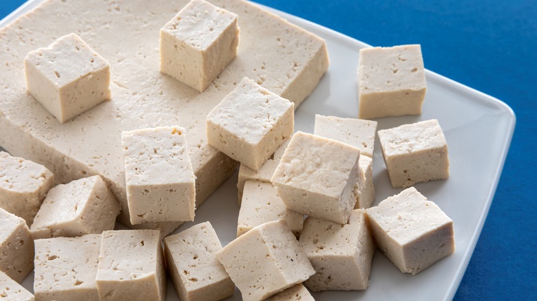 Cubes of tofu on a white plate